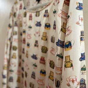 NWT Talbots cream/pastels blouse. L. Machine washable